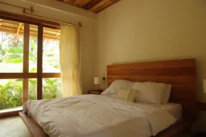 A relaxing retreat: This modern white bedroom in Siargao offers a peaceful escape.