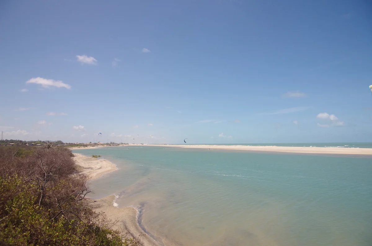A flat water lagoon in Brazil, ideal for kitesurfing, with serene waters providing the perfect setting for this water sport.